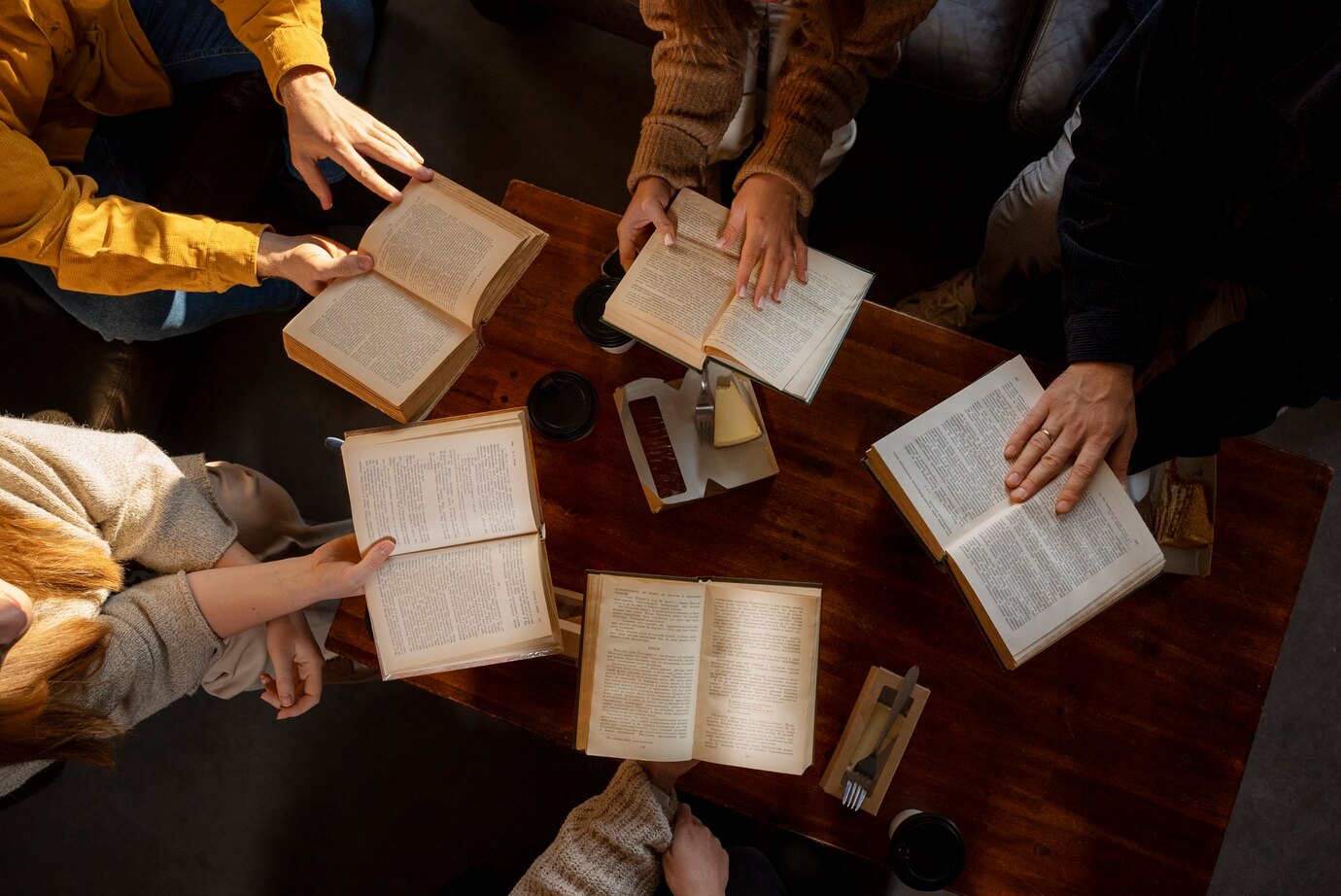 Open Bible on wooden surface